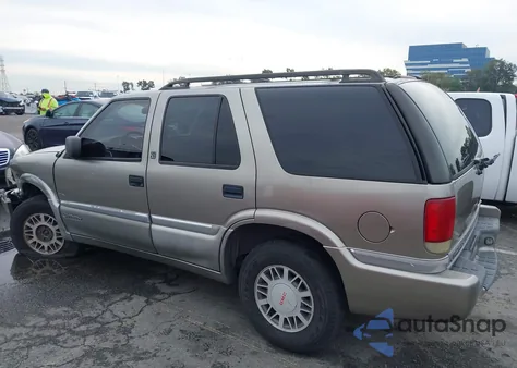 1999 GMC Jimmy Sle z USA, uszkodzony, nr VIN 1GKDT13W3X2543277